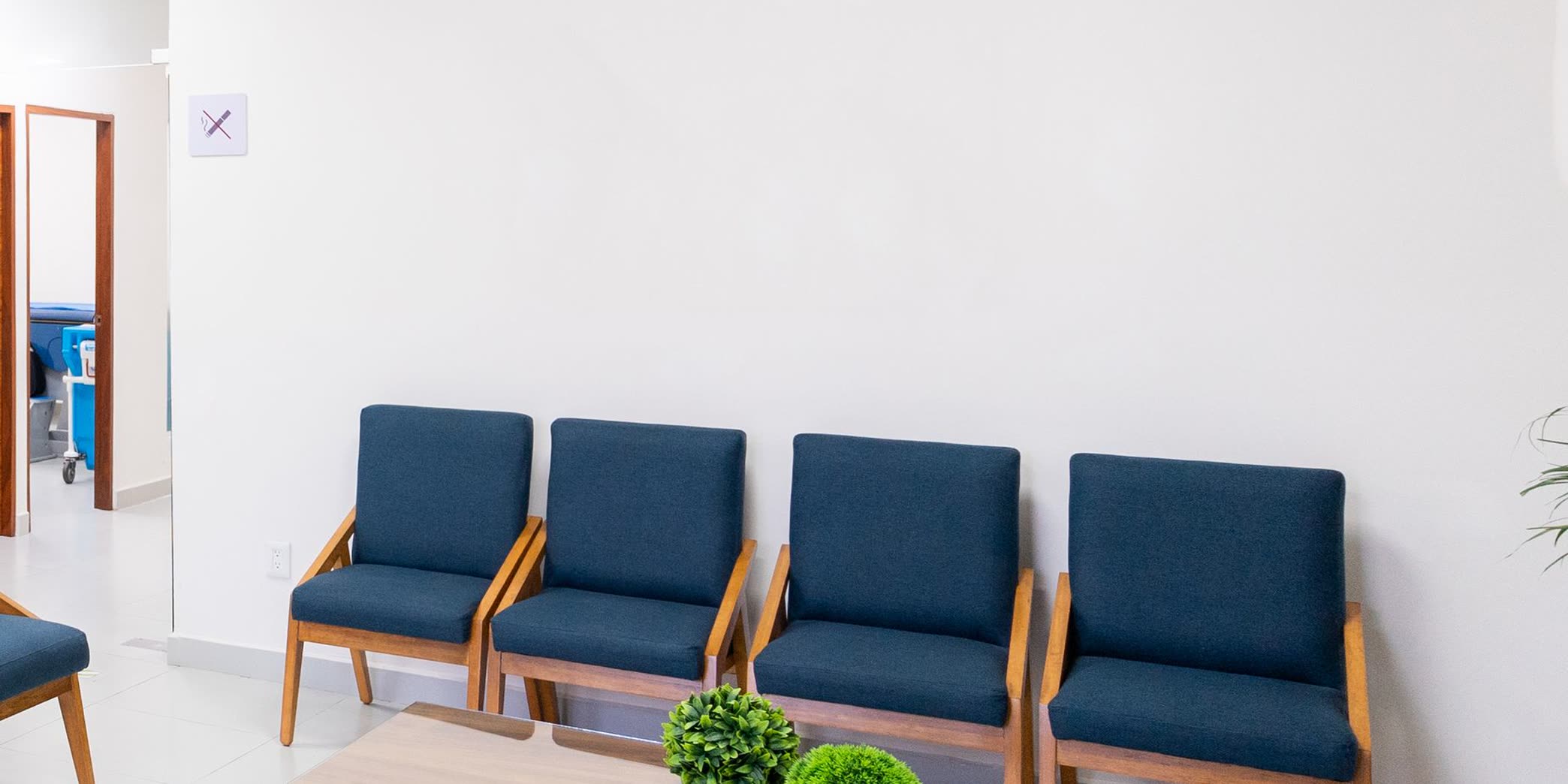 Chairs in the waiting room by the front hall
