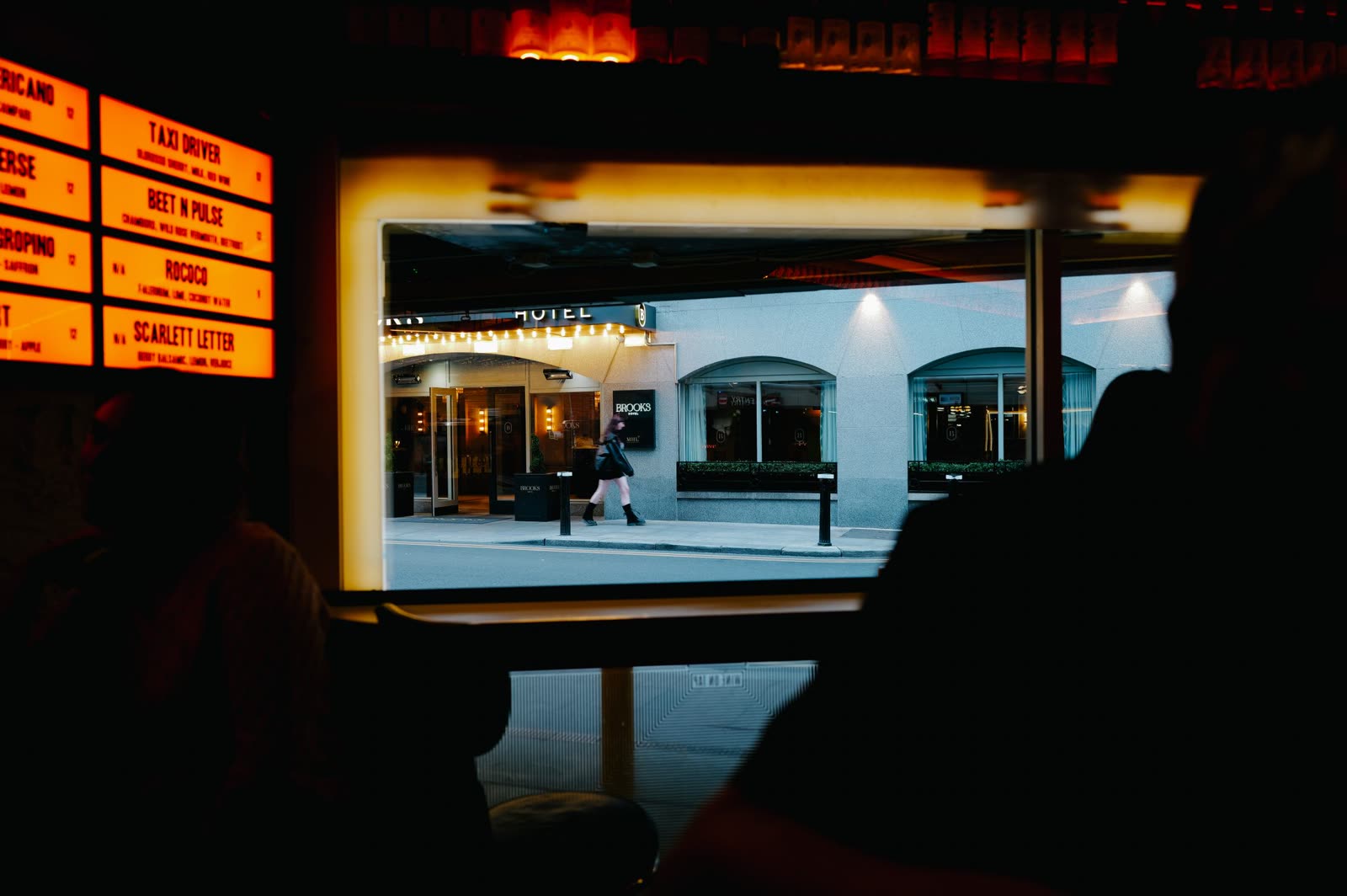 The lit back bar at COPPER LANTERN seen across the room