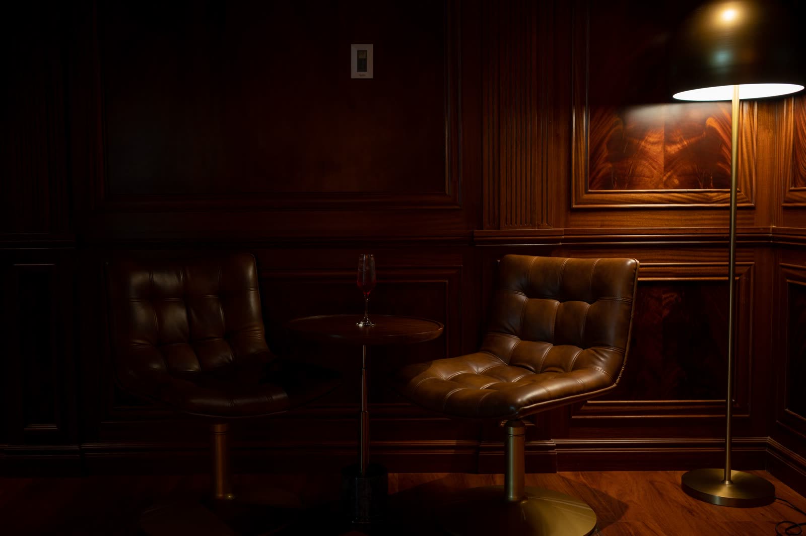 The COPPER LANTERN dining room on West Hubbard Street, lit by table lamps and candles before service