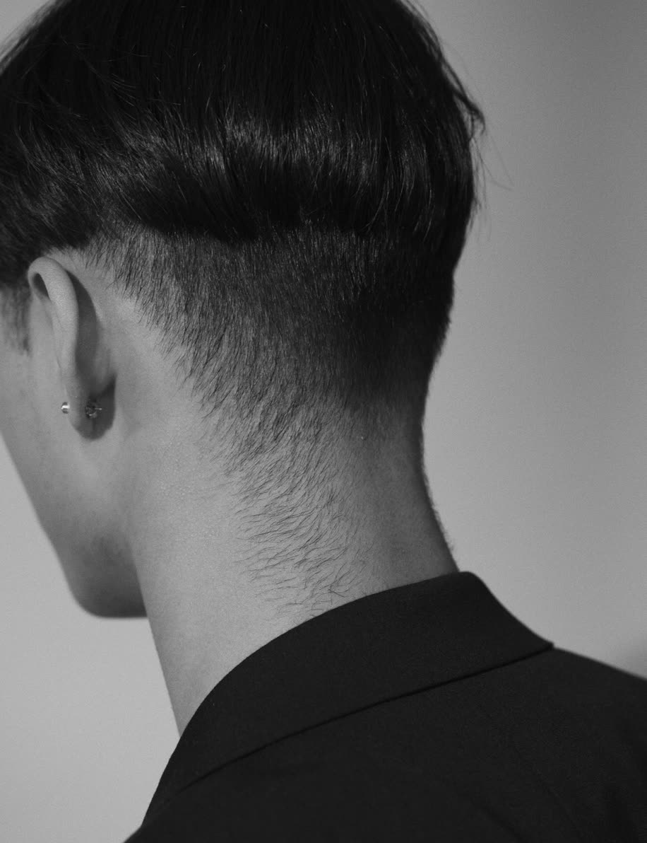 Low taper with a longer top, seen from behind