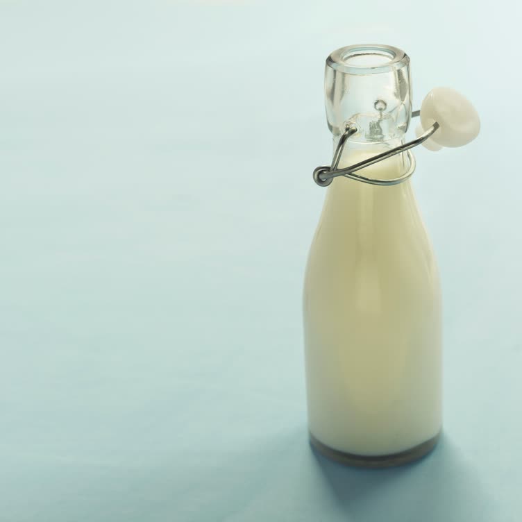 Cedar Leaf Milk Toner in a swing-top glass bottle