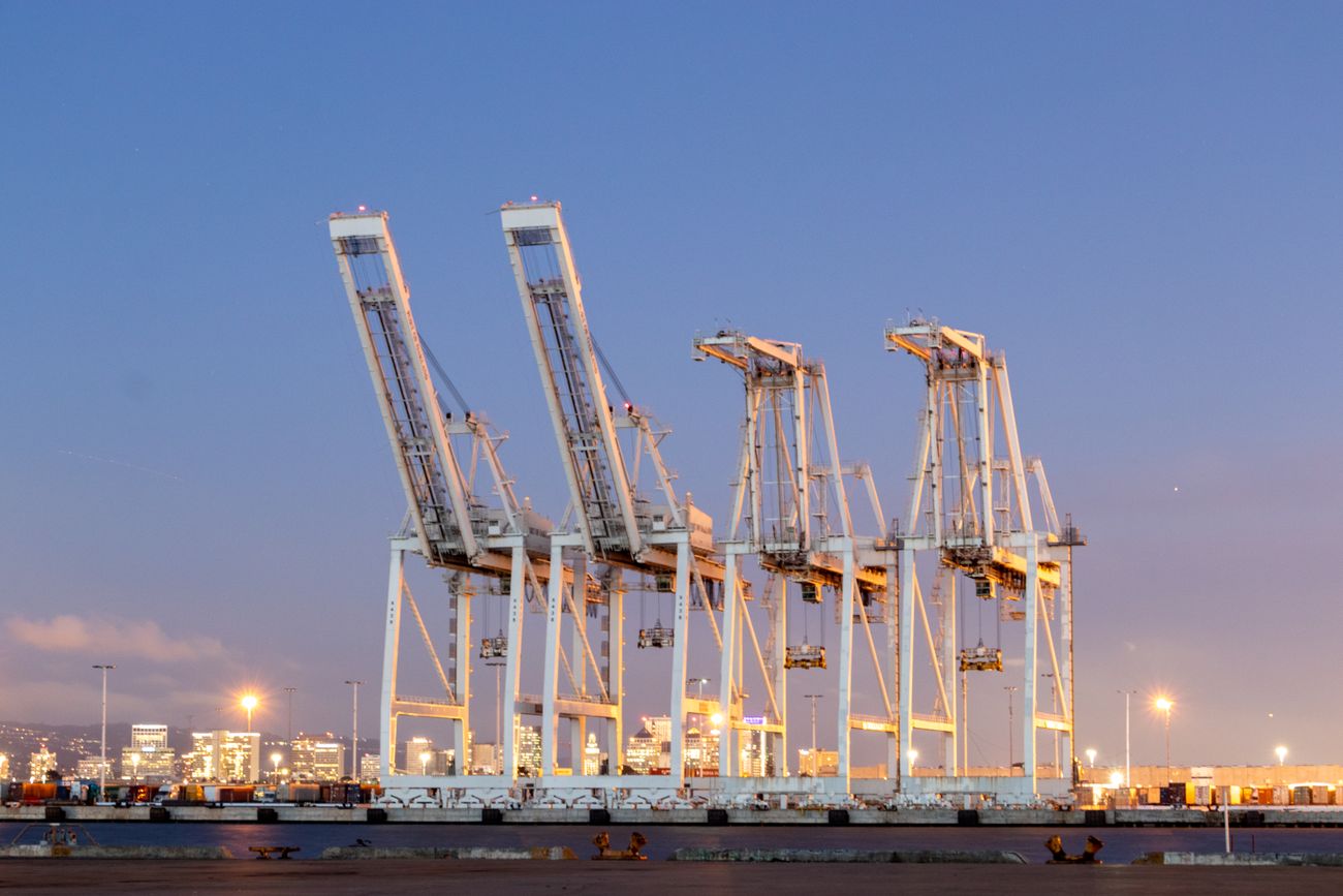 Four container cranes at a port