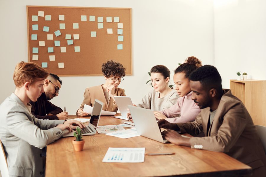 A team reviewing results around a table