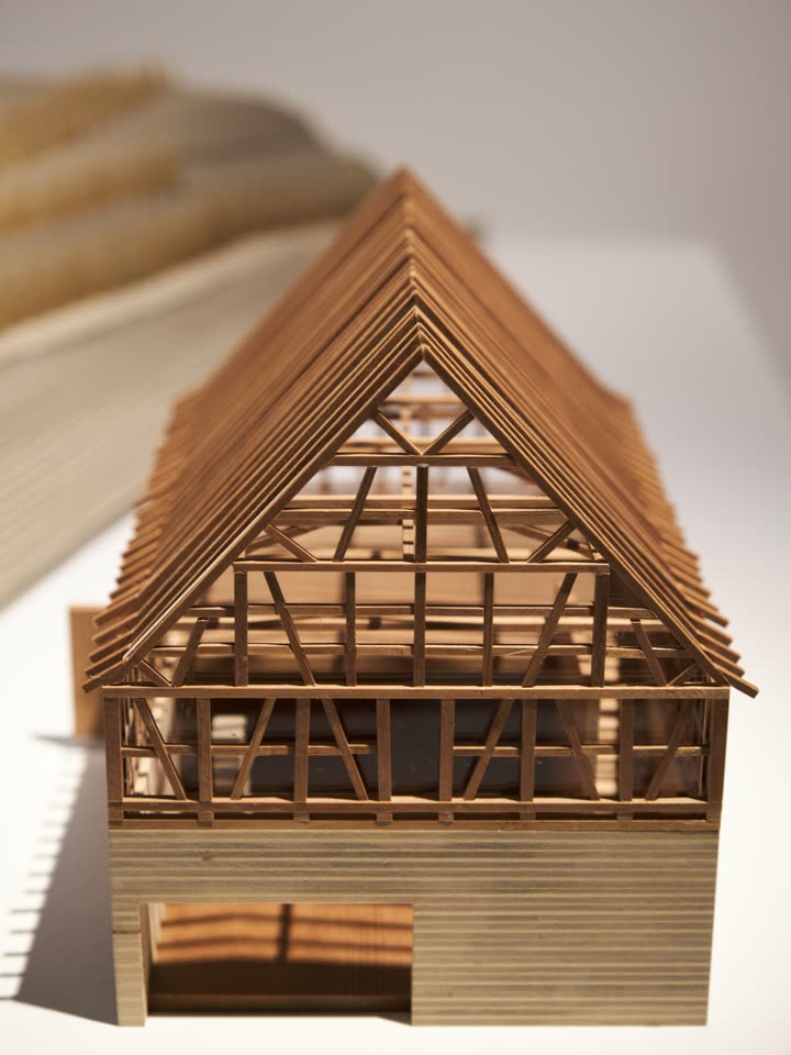 Timber study model of a gabled house frame