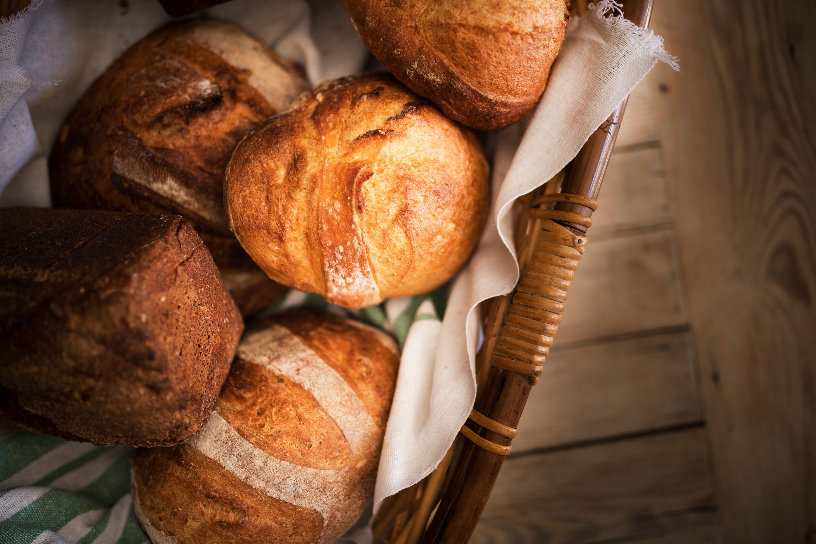 A basket of the day's country loaves and rye late in the afternoon