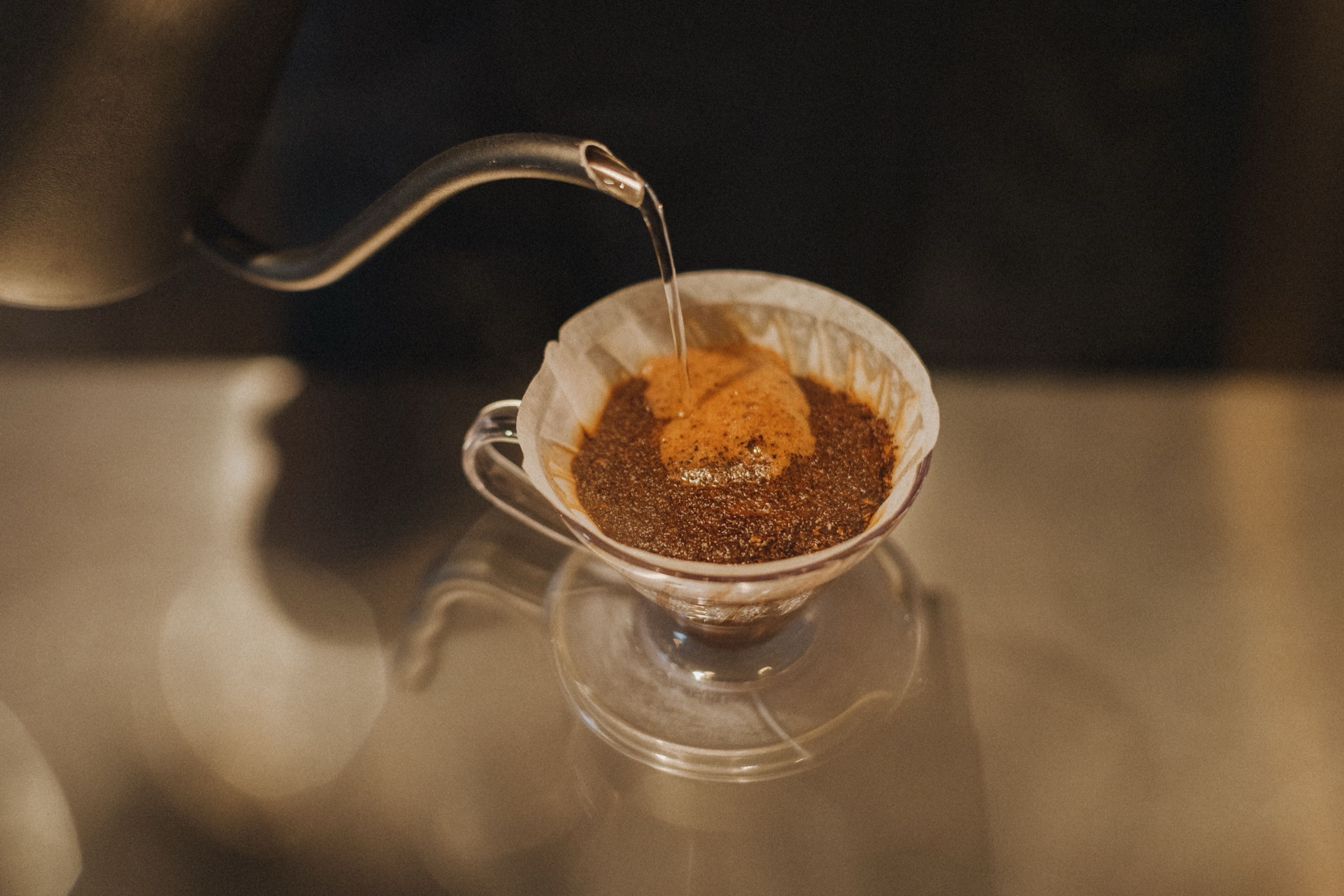 Water poured slowly over a paper-filtered pour-over